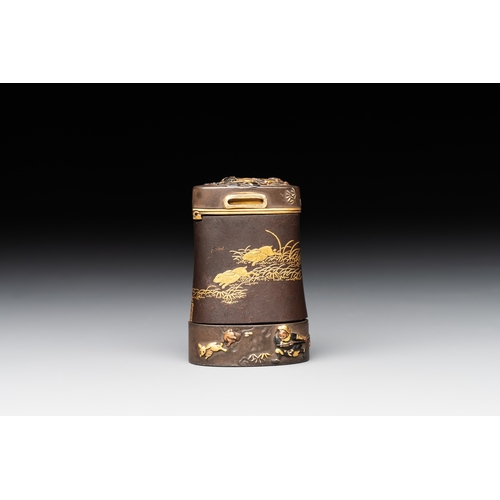 468 - A fine Japanese copper- and gold-inlaid niellated iron pyrogen with hunting scenes, Komai workshop, ... 