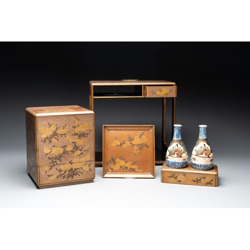 475 - A Japanese lacquerware picnic set with two sake bottles, Meiji, 19th C.Dim.: 32,5 x 19 x 36 cm (the ... 