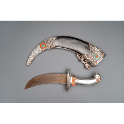 496 - A large Tibetan coral- and turquoise-inlaid silver dagger, 19th C.L.: 70,5 cm