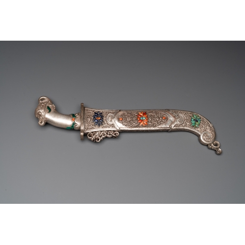 497 - A large Tibetan coral- and precious stone-inlaid silver dagger, 19th C.L.: 50,5 cm