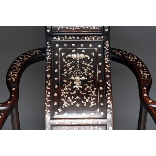 548 - A Chinese mother-of-pearl-inlaid hongmu reclining armchair and retractable footrest, Canton, 19th C.... 