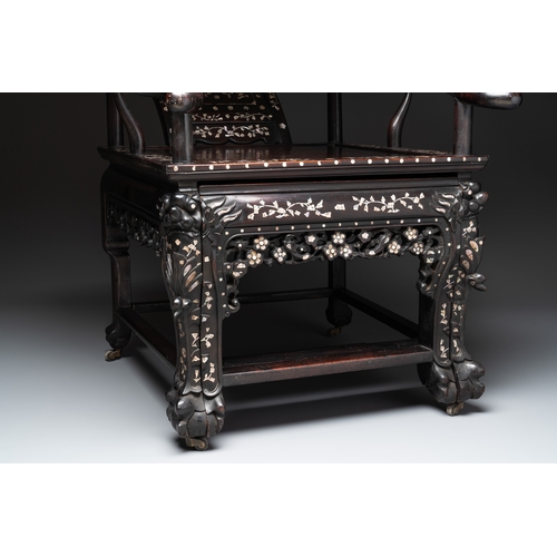 548 - A Chinese mother-of-pearl-inlaid hongmu reclining armchair and retractable footrest, Canton, 19th C.... 