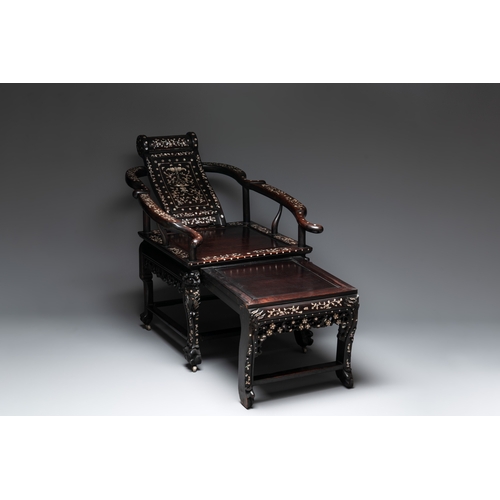 548 - A Chinese mother-of-pearl-inlaid hongmu reclining armchair and retractable footrest, Canton, 19th C.... 