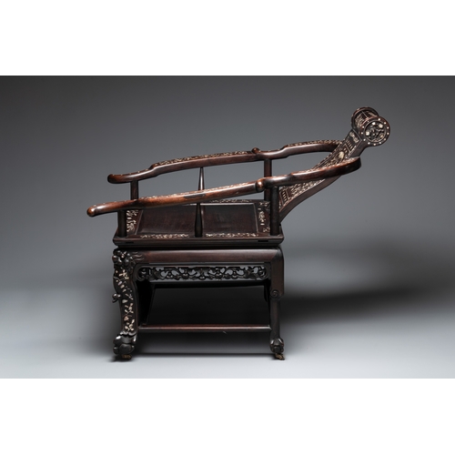 548 - A Chinese mother-of-pearl-inlaid hongmu reclining armchair and retractable footrest, Canton, 19th C.... 