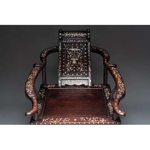 548 - A Chinese mother-of-pearl-inlaid hongmu reclining armchair and retractable footrest, Canton, 19th C.... 