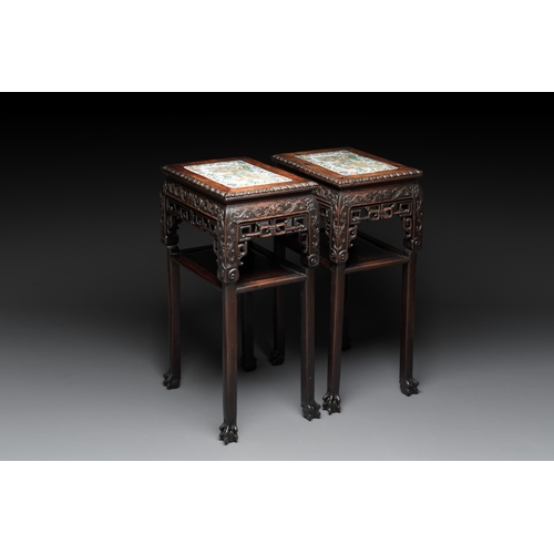 554 - A pair of Chinese famille verte 'narrative' plaques mounted in hardwood tables, 19th C.Dim.: 42 x 31... 