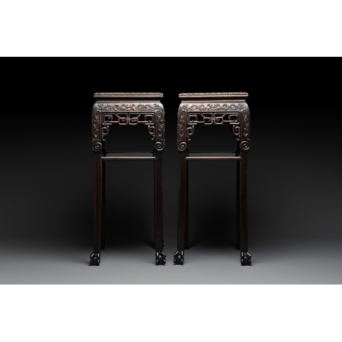 554 - A pair of Chinese famille verte 'narrative' plaques mounted in hardwood tables, 19th C.Dim.: 42 x 31... 