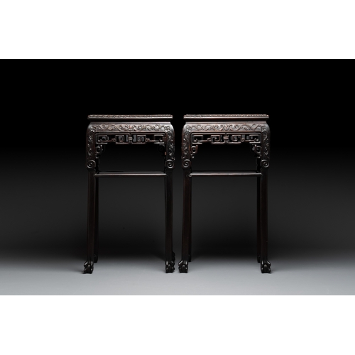 554 - A pair of Chinese famille verte 'narrative' plaques mounted in hardwood tables, 19th C.Dim.: 42 x 31... 