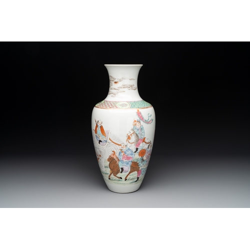 563 - A Chinese famille rose vase with figural design, Qianlong mark, 19th CH.: 33 cm 
Provenance: - A Dan... 