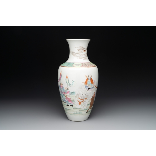 563 - A Chinese famille rose vase with figural design, Qianlong mark, 19th CH.: 33 cm 
Provenance: - A Dan... 