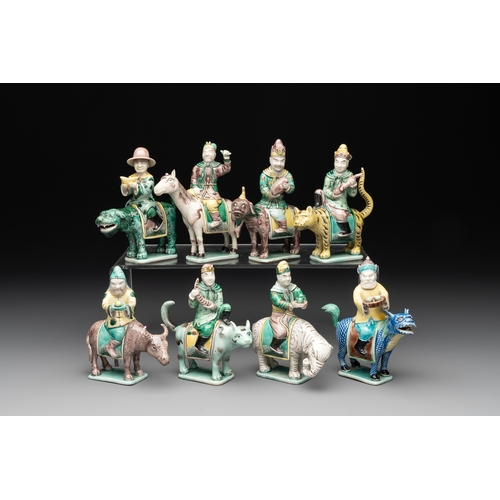 578 - Eight Chinese verte biscuit figures riding mythical animals, 19/20th C.Dim.: 8,8 x 4,8 x 12 cm (the ... 