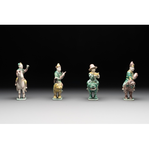 578 - Eight Chinese verte biscuit figures riding mythical animals, 19/20th C.Dim.: 8,8 x 4,8 x 12 cm (the ... 