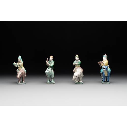 578 - Eight Chinese verte biscuit figures riding mythical animals, 19/20th C.Dim.: 8,8 x 4,8 x 12 cm (the ... 