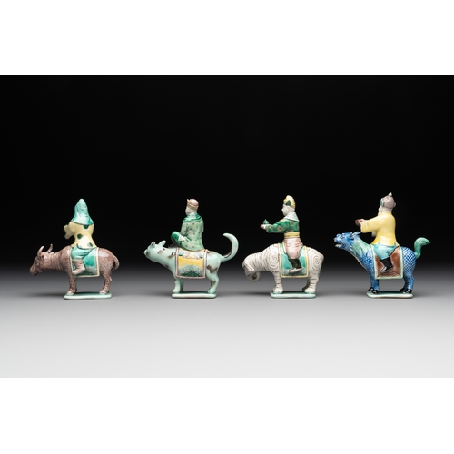 578 - Eight Chinese verte biscuit figures riding mythical animals, 19/20th C.Dim.: 8,8 x 4,8 x 12 cm (the ... 