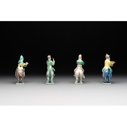 578 - Eight Chinese verte biscuit figures riding mythical animals, 19/20th C.Dim.: 8,8 x 4,8 x 12 cm (the ... 