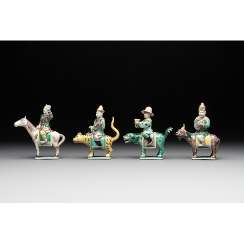 578 - Eight Chinese verte biscuit figures riding mythical animals, 19/20th C.Dim.: 8,8 x 4,8 x 12 cm (the ... 