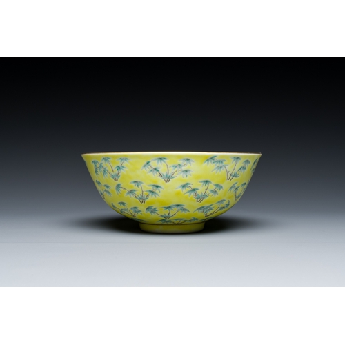 68 - A Chinese blue and white bowl with floral design and a famille verte yellow-ground 'bamboo' bowl, To... 