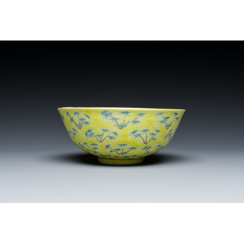 68 - A Chinese blue and white bowl with floral design and a famille verte yellow-ground 'bamboo' bowl, To... 