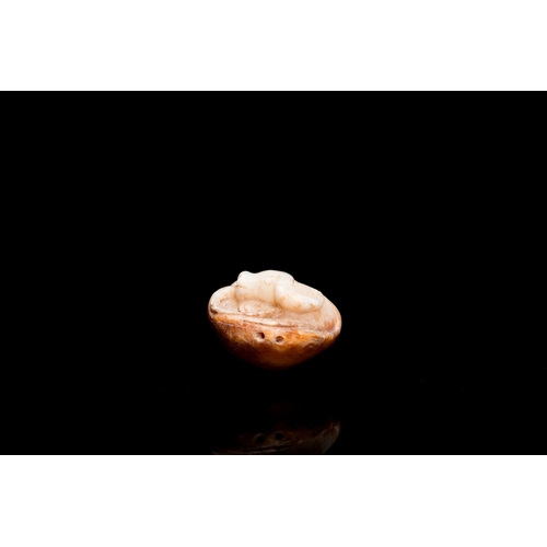 720 - Four Chinese white, celadon and russet jade pendants, Qing/RepublicDim.: 10,5 x 5,5 x 0,5 cm (the bu... 