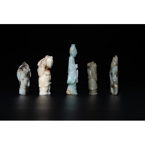 728 - Nine Chinese jade carvings of figures, 19/20th C.H.: 9 cm (the tallest carving excl. stand) H.: 4,7 ... 