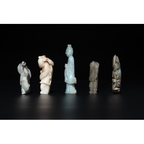 728 - Nine Chinese jade carvings of figures, 19/20th C.H.: 9 cm (the tallest carving excl. stand) H.: 4,7 ... 