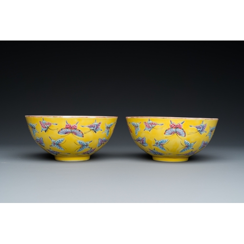 75 - A pair of Chinese famille rose yellow-ground 'butterfly' bowls, Tongzhi mark, 20th C.Dia.: 14 cm - H... 