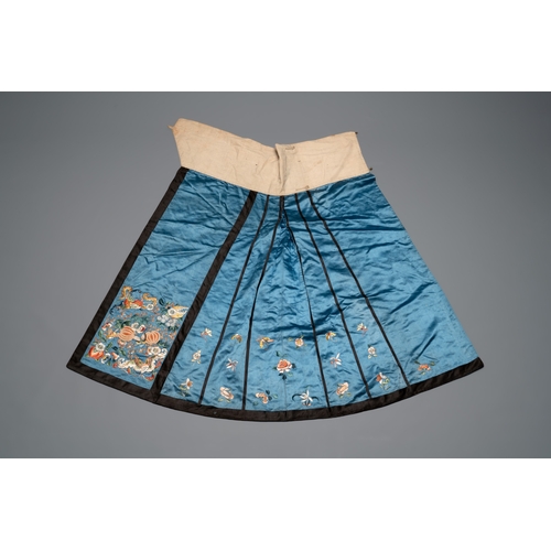 823 - A Chinese mandarin official's court hat, an embroidered silk 'phoenix' panel and a skirt, 19th C.Dia... 