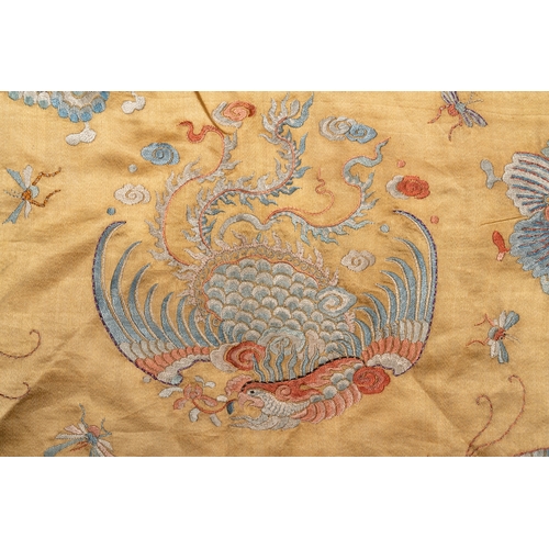 823 - A Chinese mandarin official's court hat, an embroidered silk 'phoenix' panel and a skirt, 19th C.Dia... 