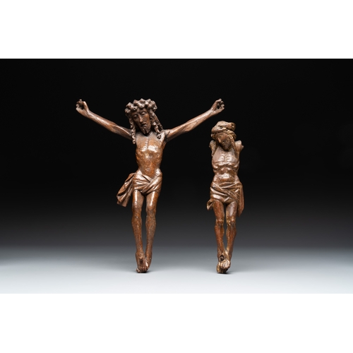 870 - Two carved oak Corpus Christi, Flanders, 15th C.Dim.: 31,5 x 27 cm (the largest) Dim.: 26 x 6,5 cm (... 