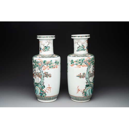 90 - A pair of Chinese famille verte rouleau vases with narrative design, 19th C.H.: 45,3 cm (the tallest... 