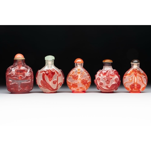 105 - A collection of 14 Peking glass snuff bottles, 19/20th C.H.: 9,7 cm (the tallest incl. stopper)H.: 5... 