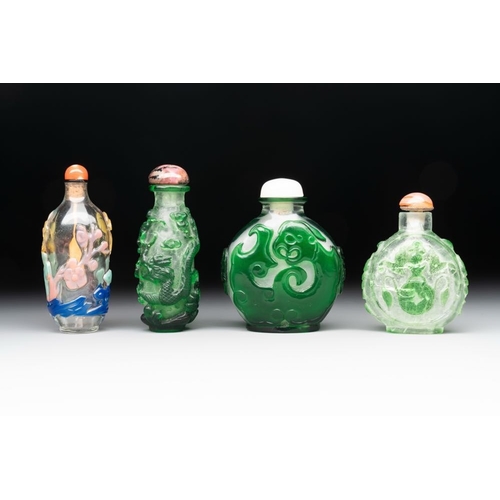 105 - A collection of 14 Peking glass snuff bottles, 19/20th C.H.: 9,7 cm (the tallest incl. stopper)H.: 5... 