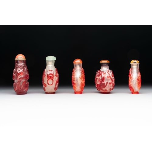 105 - A collection of 14 Peking glass snuff bottles, 19/20th C.H.: 9,7 cm (the tallest incl. stopper)H.: 5... 