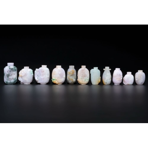 117 - A large collection of 60 Chinese jadeite snuff bottles, 20th C.H.: 7 cm (the tallest excl. stopper)H... 