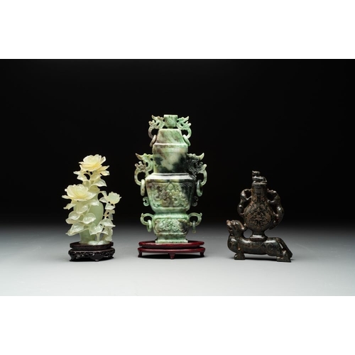 129 - Three Chinese jade vases and covers, 20th C.Dimensions from left to right as seen in the picture:- H... 