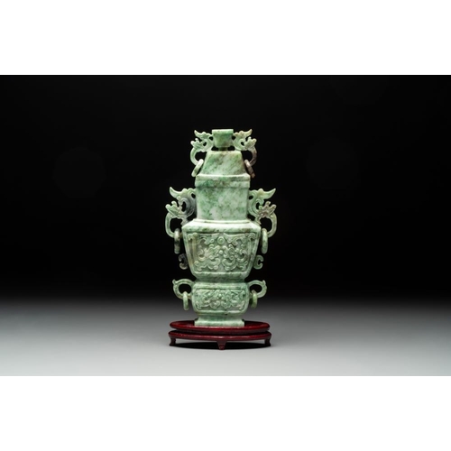 129 - Three Chinese jade vases and covers, 20th C.Dimensions from left to right as seen in the picture:- H... 