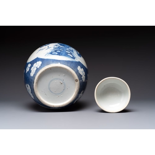 14 - A pair of Chinese blue and white bronze-mounted vases and a covered jar, 19th C.H.: 34,5 cm (the jar... 