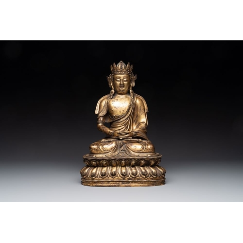 153 - A large Sino-Tibetan gilt bronze Buddha, Xuande mark, possibly MingH.: 39 cm
 Weight: 8530 grams... 