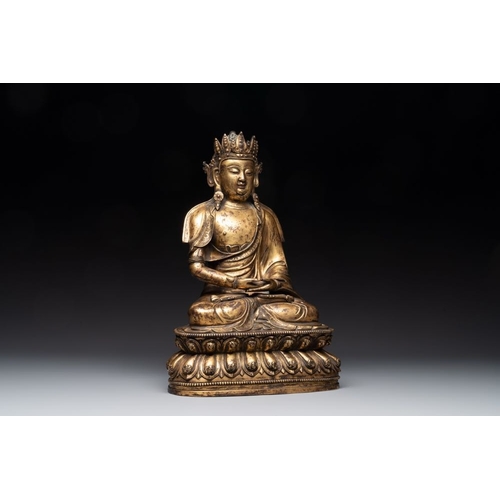 153 - A large Sino-Tibetan gilt bronze Buddha, Xuande mark, possibly MingH.: 39 cm
 Weight: 8530 grams... 