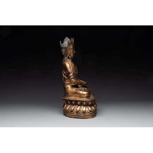 153 - A large Sino-Tibetan gilt bronze Buddha, Xuande mark, possibly MingH.: 39 cm
 Weight: 8530 grams... 