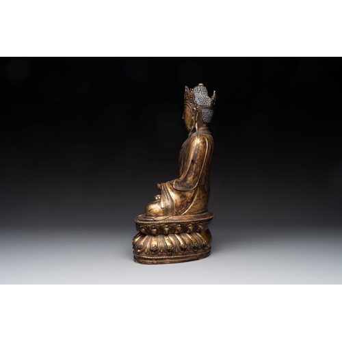 153 - A large Sino-Tibetan gilt bronze Buddha, Xuande mark, possibly MingH.: 39 cm
 Weight: 8530 grams... 