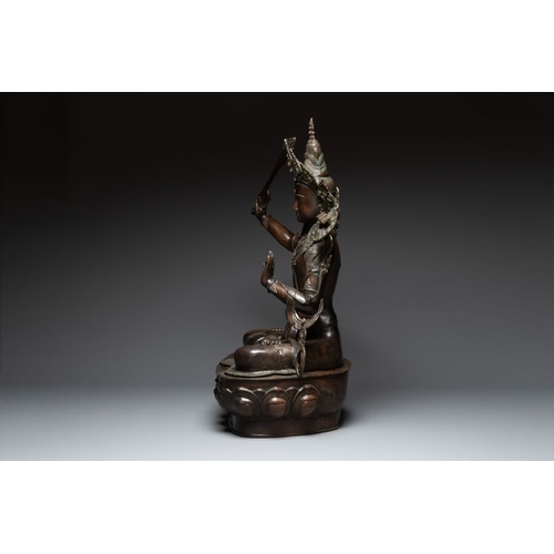 156 - A very large Nepalese bronze sculpture of Manjusri, 19/20th C.H.: 100,5 cm
 Weight: 15,6 kilograms... 