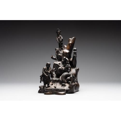 160 - A rare Chinese bronze group depicting two immortals and various animals in a mountainous landscape, ... 