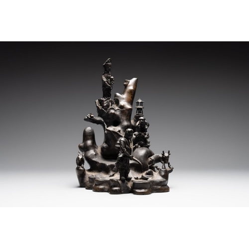 160 - A rare Chinese bronze group depicting two immortals and various animals in a mountainous landscape, ... 