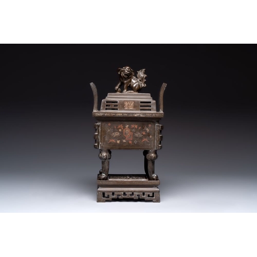 171 - A large Vietnamese copper- and silver-inlaid rectangular 'Buddhist lion' censer and cover on stand, ... 