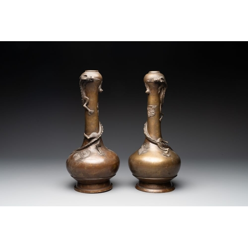 174 - A pair of Chinese or Vietnamese gold-splashed bronze garlic-mouth 'dragon' vases, with seal mark, 17... 