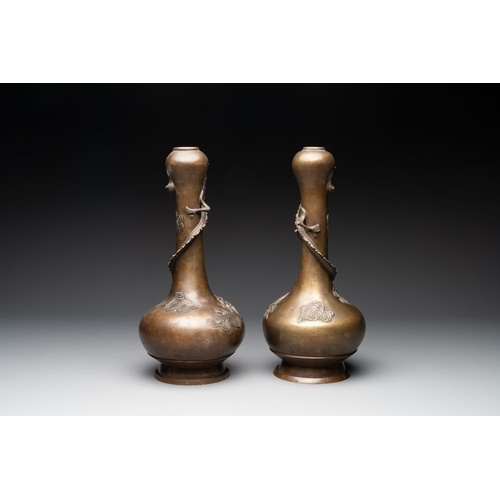 174 - A pair of Chinese or Vietnamese gold-splashed bronze garlic-mouth 'dragon' vases, with seal mark, 17... 