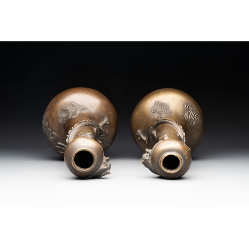 174 - A pair of Chinese or Vietnamese gold-splashed bronze garlic-mouth 'dragon' vases, with seal mark, 17... 