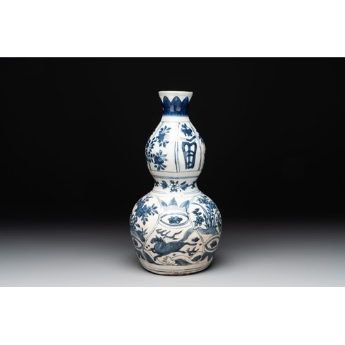 187 - A Chinese blue and white 'flying horse' double gourd vase, WanliH.: 28 cm
 Provenance: - A Danish pr... 