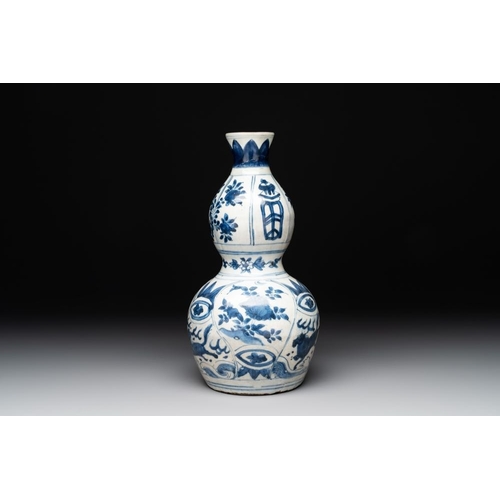 187 - A Chinese blue and white 'flying horse' double gourd vase, WanliH.: 28 cm
 Provenance: - A Danish pr... 